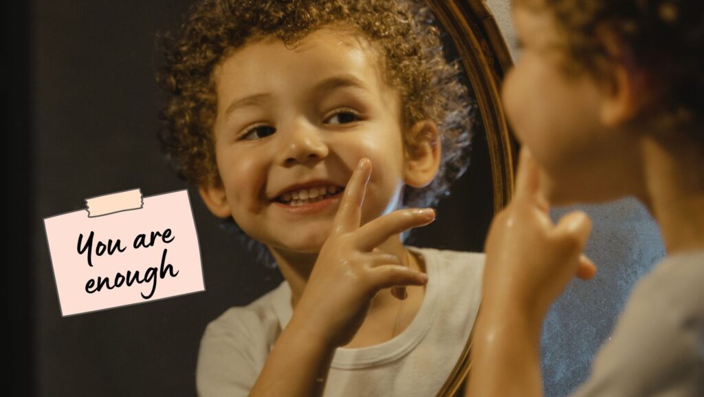 A cozy corner with a mirror and a note reading, “You are enough.”