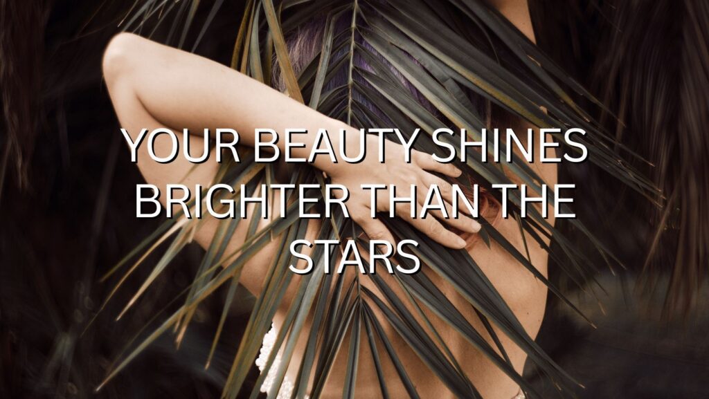 A vibrant sunset over a field with the text, “Your beauty shines brighter than the stars.